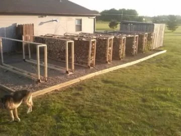 [Hearth.com] Back yard wood stacks and fresh mulch