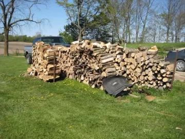 [Hearth.com] Adding to the wood pile puts a smile on my face!