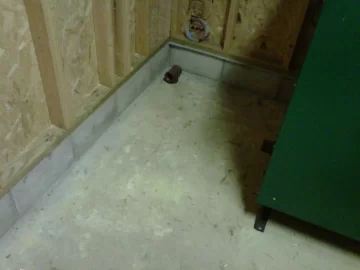 [Hearth.com] Where to cut hole in concrete behind boiler?