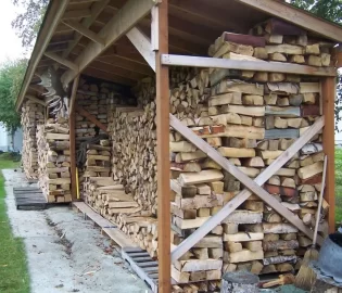 [Hearth.com] 14/15 wood starting to fill up the wood shed.