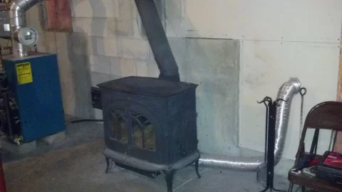 [Hearth.com] Wood stove in basement next to oil furnace