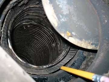 [Hearth.com] Seam where insert and stove pipe elbow meet