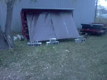 [Hearth.com] Wood shed loaded 2/3 of the way.