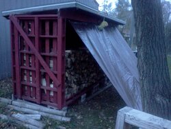 Wood shed loaded 2/3 of the way.