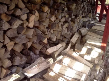 [Hearth.com] Wood shed loaded 2/3 of the way.