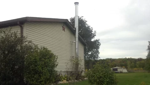 [Hearth.com] Chimney through roof overhang?