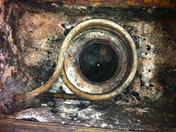 Can I convert this oil stove into an efficient wood stove?