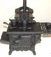 Cast Iron Wood Stove with Pots.jpg