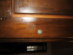 removing plate behind kitchen cabinet pull (estucheon plate?)