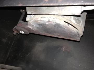 [Hearth.com] Quadrafire Contour Fire Pot swing plate loose.