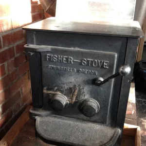 Fisher wood stove from the 70s? (though we likely bought it used at the time, so it could be older)