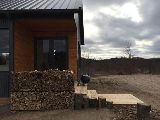 Back porch, after wood rack installation