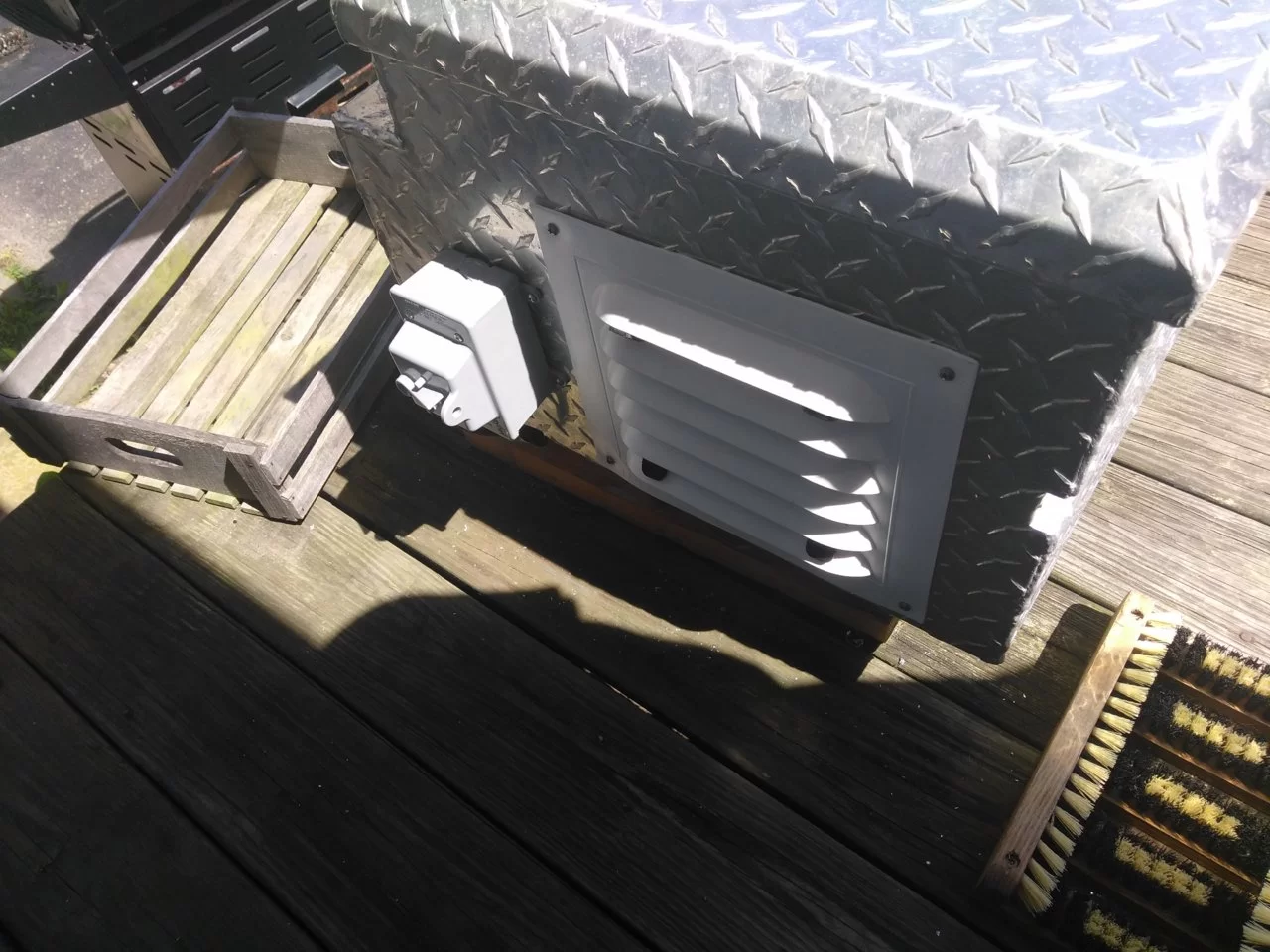 Kindling box vent and solar disconnect