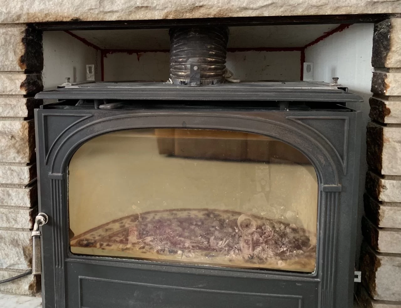 Can I use wool, rocks or sand to improve this burner assembly? : r/ Fireplaces