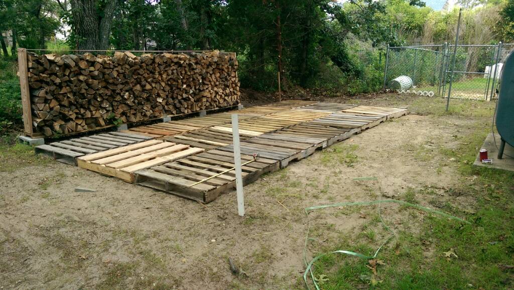 Carport woodshed.