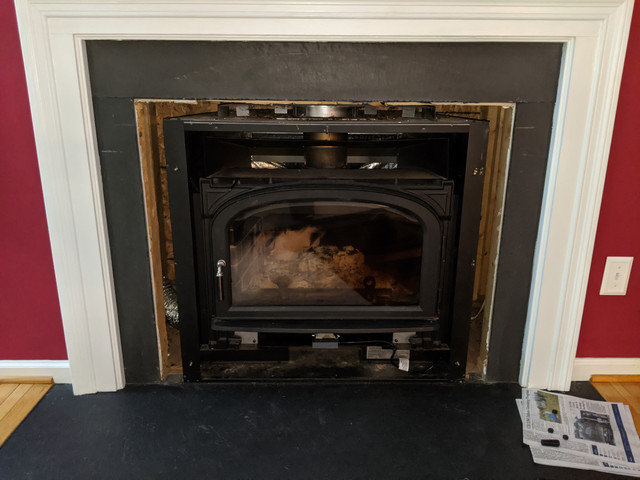 Safe? Vermont castings insert w/ plywood fireplace