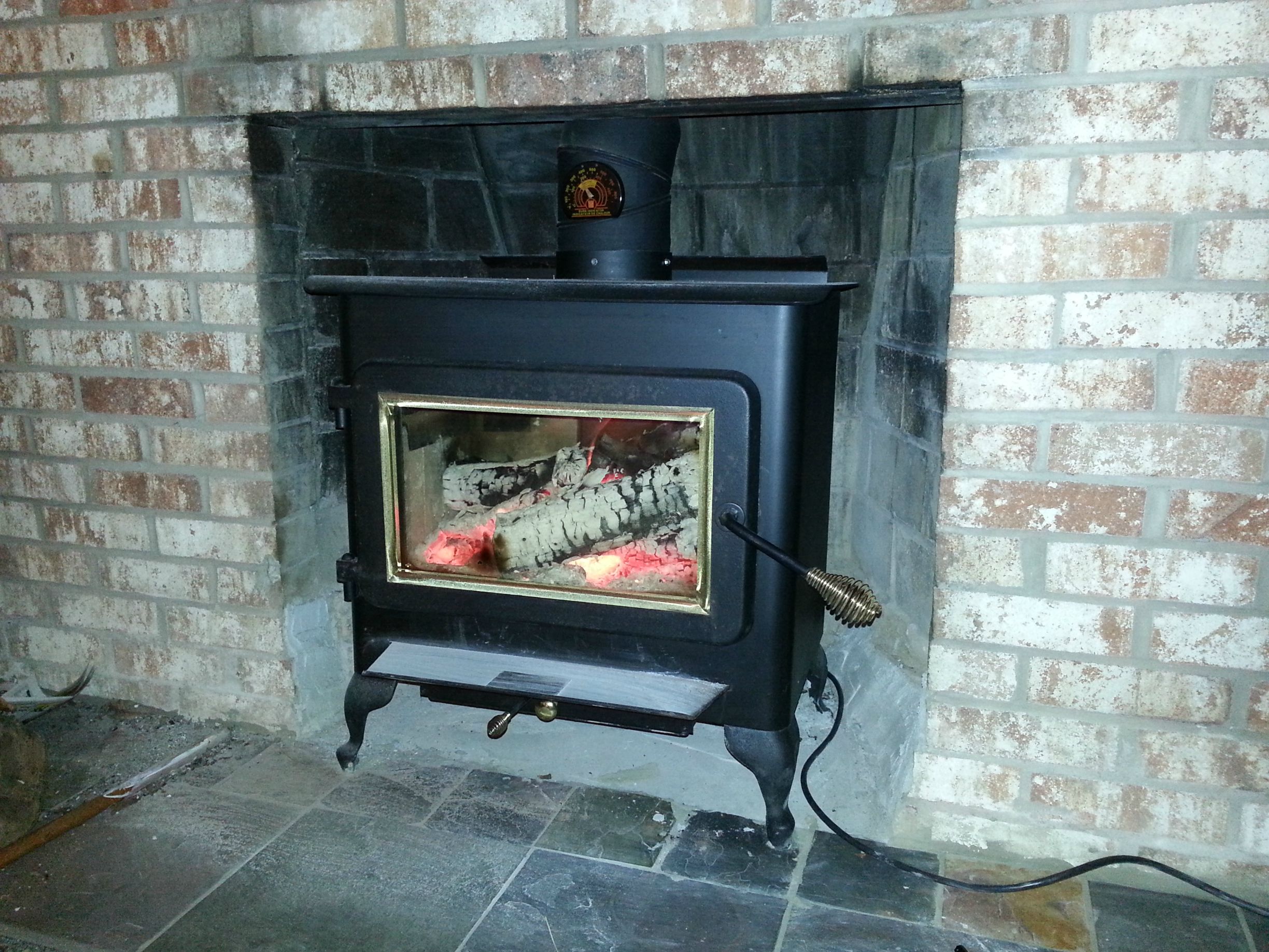 Can I make this stove fit in my fireplace?