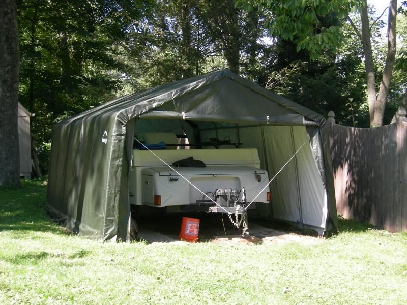 Carport woodshed.