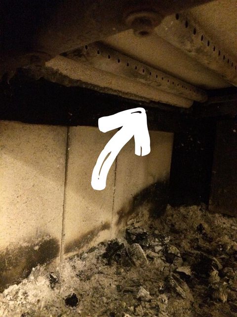 [Hearth.com] Cement? broke off inside Oslo. Do I need to worry about this?