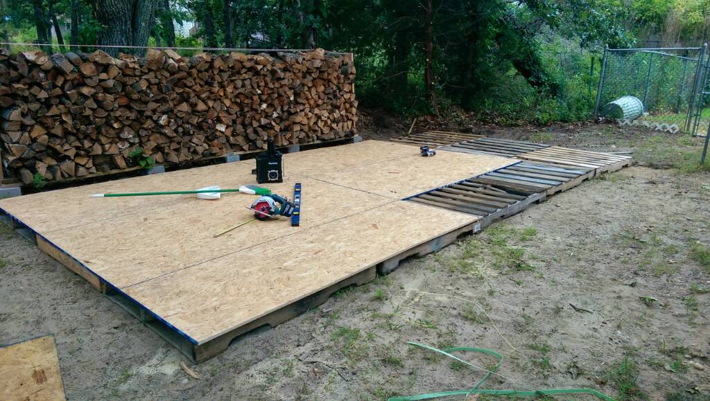 Carport woodshed.