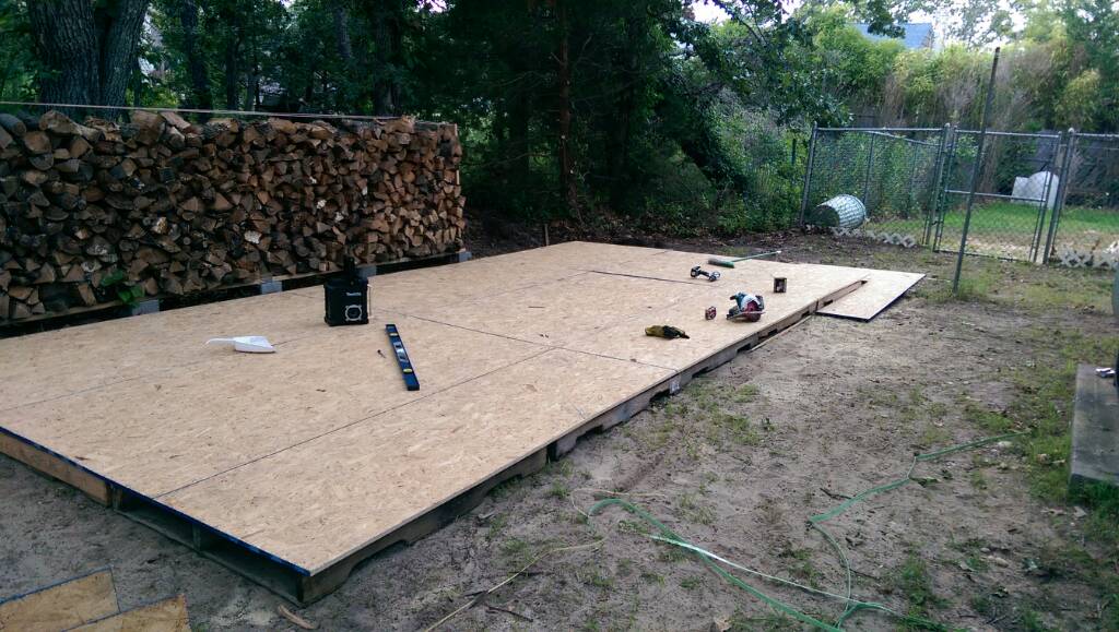 Carport woodshed.